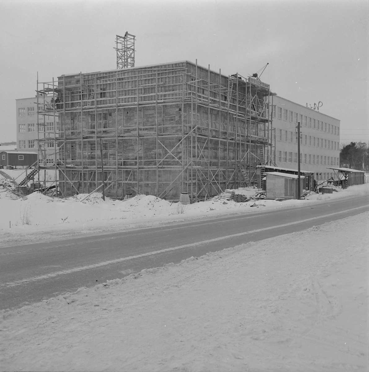 Byggearbeid ved Nidar Chokoladefabriks nye bygg i Bromstadvegen