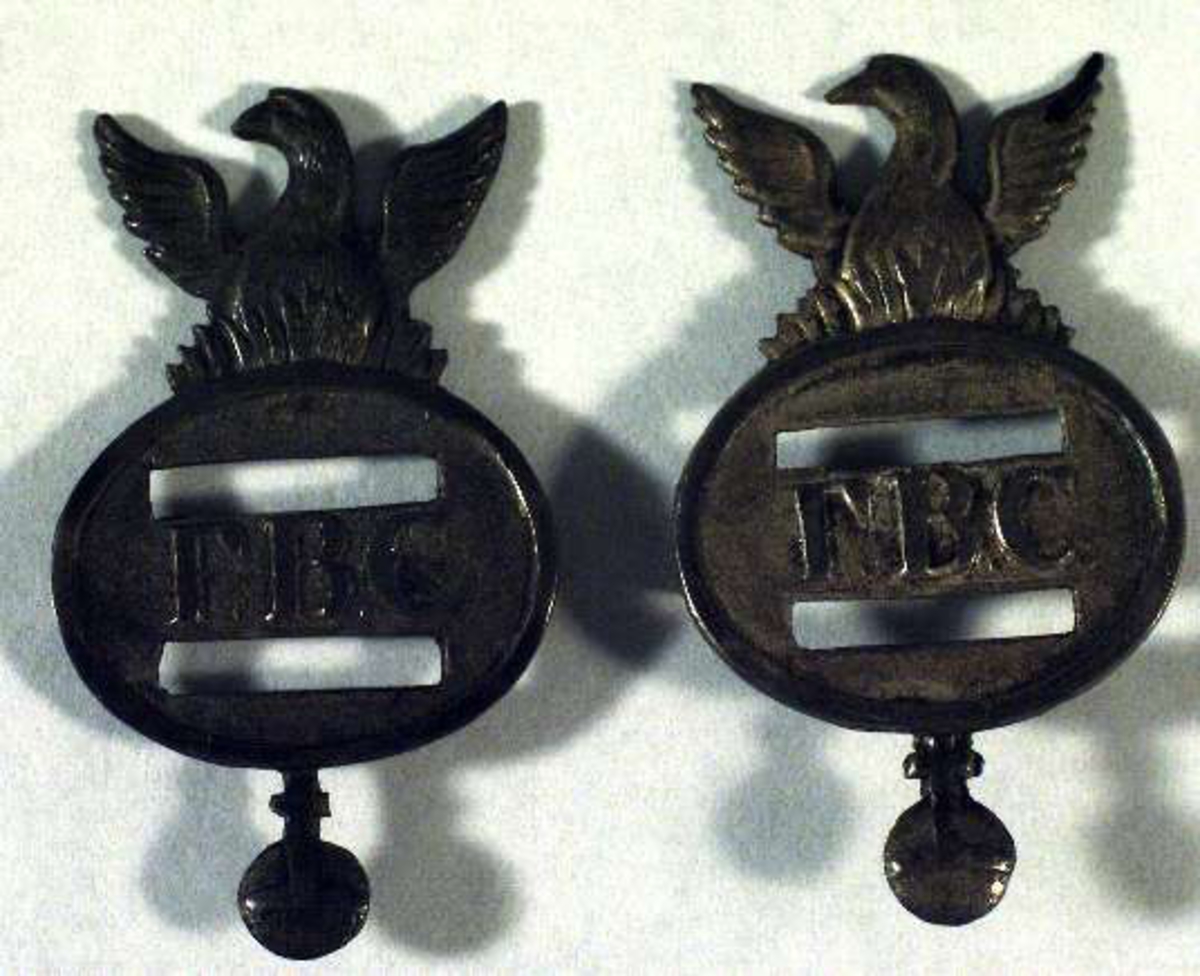 Emblem av silver. tämplade: FAW, Uppsala stadsvapen, C 5 = 1857. Fågel Phoenix, Uppsala stadsvapen och initialerna F.B.C.