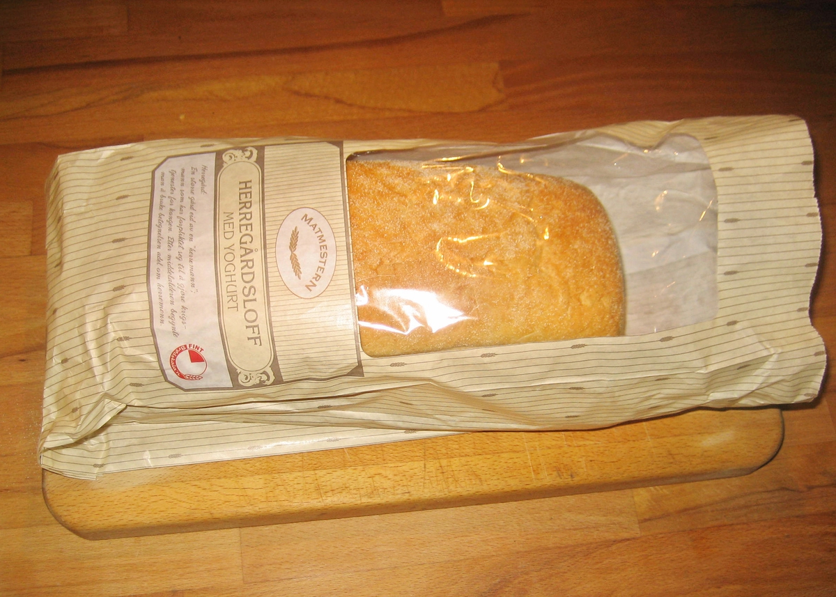 Brødposen har et stribet mønster med kornaks.