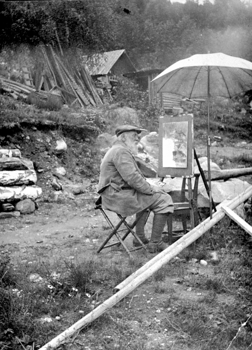 Ringsaker, Veldre, Løken Østre, Kunstmaler Wilhelm Peters (1851-1935) ved staffeliet. Gjest på Løken østre,