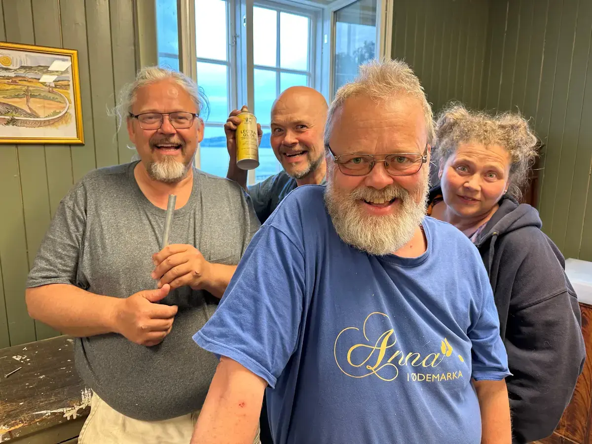 Tre menn og en dame